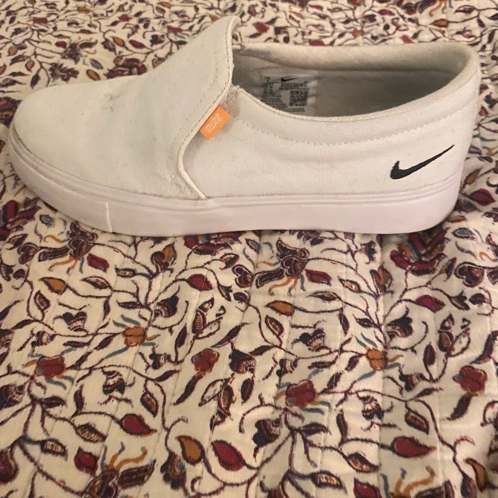 White Nike slip ons